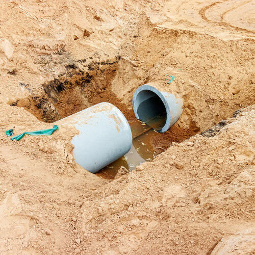 a damaged sewer line in the ground